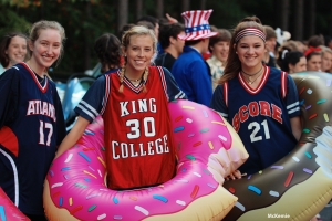 Juniors Abbie Blauser, Madison McKemie, and Maddie Lloyd dress up as "Dunkin Donuts" for Friday's theme day of made in America.